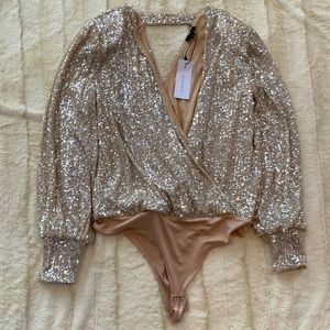 New with tags sparkling gold bodysuit